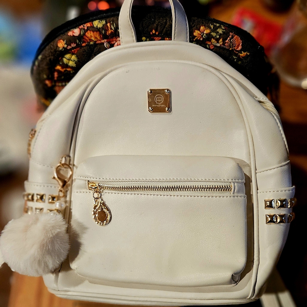 Elegant White Backpack/Purse with Gold Accents